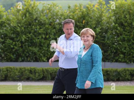 Bildnummer: 59847587  Datum: 17.06.2013  Copyright: imago/Xinhua (130618) -- FERMANAGH,  2013 (Xinhua) -- Britain s Prime Minister David Cameron (L) talks with German Chancellor Angela Merkel during the official welcome as world leaders arrive for the openning ceremony of the G8 Summit at the Lough Erne resort near Enniskillen in Northern Ireland June 17, 2013. The focus of the Group of Eight (G8) industrialized nations annual summit were expected to be on Syria and economic issues. (Xinhua/Yin Gang) UK-G8-SUMMIT-OPENING PUBLICATIONxNOTxINxCHN People Politik G8 G 8 Gipfel Nordirland Fermanagh Stock Photo