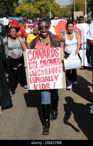 Bildnummer: 59916825  Datum: 28.06.2013  Copyright: imago/Xinhua (130628) -- PRETORIA, June 28, 2013 (Xinhua) -- holding placard attend a protest against the official visit of U.S. President Barack Obama in Pretoria, June 28, 2013. Obama arrived in South Africa Friday evening on a three-day official visit aimed at promoting bilateral ties and seeking business opportunities. The visit came amid massive protests in front of the U.S. embassy in Pretoria and several other places. (Xinhua/Guo Xinghua) SOUTH AFRICA-PRETORIA-PROTEST-OBAMA PUBLICATIONxNOTxINxCHN xas x2x 2013 hoch premiumd  o0 Politik Stock Photo