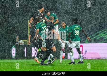 Lommel, Belgium. 26th Aug, 2023. Duel in the rain pictured during a soccer game between SK Lommel and KMSK Deinze on the third matchday in the Challenger Pro League for the 2023-2024 on August 26, 2023 in Lommel, Belgium. Credit: sportpix/Alamy Live News Stock Photo