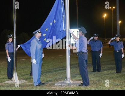 Bildnummer: 59923545  Datum: 01.07.2013  Copyright: imago/Xinhua (130701) -- BAJAKOVO, July 1, 2013 (Xinhua) -- Border Police and Custom officials raise the EU flag at the point of entry into the Republic of Croatia during official ceremony at Bajakovo border crossing with Serbia, early July 1, 2013. Croatia joined the European Union as the 28th member state on July 1, 2013. (Xinhua/Miso Lisanin) CROATIA-EU-BAJAKOVO BORDER CROSSING PUBLICATIONxNOTxINxCHN Politik CRO EU Beitritt Mitglied xas x2x 2013 quer premiumd o0 Flaggenzeremonie     59923545 Date 01 07 2013 Copyright Imago XINHUA   July 1 Stock Photo