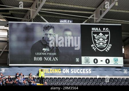 The scoreboard pays tribute to Rob Nolan former Hull FC player ahead of the Betfred Super League Round 23 match Hull FC vs Warrington Wolves at MKM Stadium, Hull, United Kingdom, 26th August 2023  (Photo by James Heaton/News Images) Stock Photo