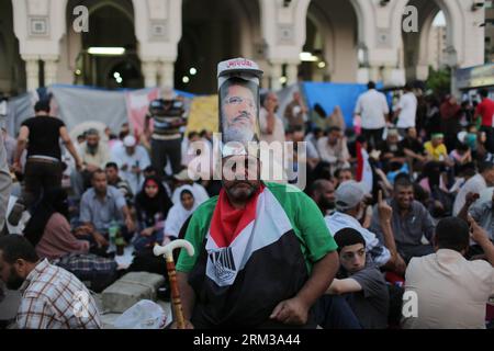 Bildnummer: 60118378  Datum: 12.07.2013  Copyright: imago/Xinhua (130712) -- CAIRO, July 12, 2013 (Xinhua) -- A supporter of ousted Egyptian President Mohamed Morsi attends a protest near the Rabaa al-Adawiya mosque, in Cairo, Egypt, July 12, 2013. (Xinhua/Wissam Nassar) EGYPT-CAIRO-UNREST-PROTEST PUBLICATIONxNOTxINxCHN Gesellschaft Politik Ägypten Demo Protest xdp x0x 2013 quer premiumd      60118378 Date 12 07 2013 Copyright Imago XINHUA  Cairo July 12 2013 XINHUA a Supporter of ousted Egyptian President Mohamed Morsi Attends a Protest Near The  Al  Mosque in Cairo Egypt July 12 2013 XINHUA Stock Photo