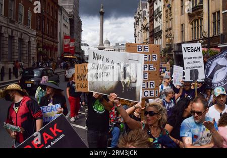 London, UK. 26th Aug, 2023. A protester holds an anti-dairy placard during the demonstration in Whitehall. Crowds marched through central London during the National Animal Rights March, demanding an end to all forms of animal exploitation and abuse, and in support of animal rights and veganism. Credit: SOPA Images Limited/Alamy Live News Stockfoto
