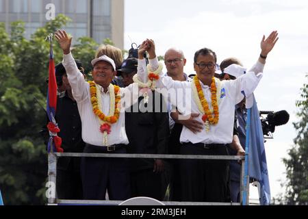 Bildnummer: 60210945  Datum: 26.07.2013  Copyright: imago/Xinhua (130726) -- PHNOM PENH, July 26, 2013 (Xinhua) -- Cambodia s opposition Party -- National Rescue Party leader Sam Rainsy (R, front) attends an election campaign at the Freedom Park in Phnom Penh, Cambodia, July 26, 2013. Cambodia s fifth parliamentary elections are ready to kick off on Sunday, a National Election Committee (NEC) official said Friday. (Xinhua/Sovannara) CAMBODIA-PHNOM PENH-PARLIAMENTARY ELECTION-CAMPAIGN PUBLICATIONxNOTxINxCHN Politik Demo premiumd x0x xmb 2013 quer      60210945 Date 26 07 2013 Copyright Imago XI Stock Photo