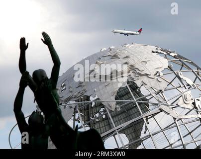 Flushing Meadow, United States. 26th Aug, 2023. A Delta Airlines airplane flies over the spherical stainless steel representation of the Earth know as the Unisphere and the Freedom of the Human Spirit statue in Corona Park at site of the 2023 US Open Tennis Championships at the USTA Billie Jean King National Tennis Center on Saturday, August 26, 2023 in New York City. Photo by John Angelillo/UPI Credit: UPI/Alamy Live News Stock Photo