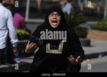 Bildnummer: 60364657  Datum: 16.08.2013  Copyright: imago/Xinhua (130816) -- CAIRO, Aug. 16, 2013 (Xinhua) -- A female protester chants slogans during a rally in downtown Cairo, Aug. 16, 2013. Tens of thousands of Egyptians flocked to the streets Friday across Egypt in defiance of a military-imposed state of emergency following the country s bloodshed earlier this week, meanwhile clashes erupted in several cities causing the death of dozens of Egyptians. (Xinhua) EGYPT-CAIRO-PORTEST PUBLICATIONxNOTxINxCHN Gesellschaft Politik Ägypten Unruhen Konflikt Zusammenstösse xcb x2x 2013 quer premiumd o Stock Photo