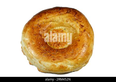 Tandyr nan usbekisches Brot, eine Art zentralasiatisches Brot, das oft mit Stempelmustern auf den Teig mit einem Brotstempel verziert wird, der als Chekich al bekannt ist Stockfoto