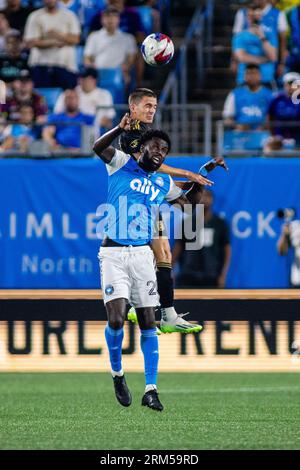 August 26, 2023: Los Angeles FC defender Aaron Long (33) wins the header against Charlotte FC midfielder Derrick Jones (20) during the second half of the Major League Soccer match up at Bank of America Stadium in Charlotte, NC. (Scott KinserCal Sport Media) Credit: Cal Sport Media/Alamy Live News Stock Photo