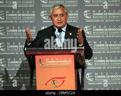 Bildnummer: 60618594  Datum: 20.10.2013  Copyright: imago/Xinhua JALISCO, Oct. 20, 2013 - Guatemalan President Otto Perez Molina delivers a speech during the 11th Mexico Business Summit in the city of Guadalajara, Jalisco, Mexico, on Oct. 20, 2013. The three-day summit opened here on Sunday. (Xinhua/Xolo) MEXICO-JALISCO-BUSINESS SUMMIT PUBLICATIONxNOTxINxCHN People Politik premiumd x0x xmb 2013 quer     60618594 Date 20 10 2013 Copyright Imago XINHUA Jalisco OCT 20 2013 Guatemalan President Otto Perez Molina delivers a Speech during The 11th Mexico Business Summit in The City of Guadalajara Ja Stock Photo