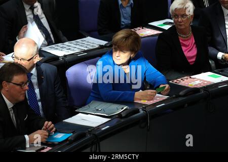 Bildnummer: 60626450  Datum: 22.10.2013  Copyright: imago/Xinhua (131022) -- BERLIN, Oct. 22, 2013 (Xinhua) -- German Chancellor Angela Merkel (2nd R) attends the constitutive meeting at the Bundestag (lower house) in Berlin, Germany, on Oct. 22, 2013. The newly elected German Parliament met for the first time on Tuesday as Chancellor Angela Merkel s conservatives are due to launch formal negotiations with the main opposition on forming a coalition government. (Xinhua/Zhang Fan) GERMANY-BERLIN-POLITICS-PARLIAMENT PUBLICATIONxNOTxINxCHN People Politik GER Bundestag Bundestagssitzung Sitzung xdp Stock Photo