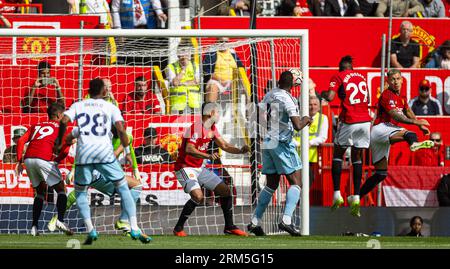 Manchester, UK. 26th Aug, 2023. Nottingham Forest's Willy Boly (3rd R) scores his team's second goal during the FA Premier League match between Manchester United FC and Nottingham Forest FC at Old Trafford in Manchester, Britain, on Aug. 26, 2023. Man Utd won 3-2. Credit: Xinhua/Alamy Live News Stock Photo