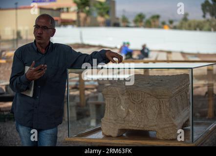 Bildnummer: 60786824  Datum: 02.12.2013  Copyright: imago/Xinhua     TIBERIAS (ISRAEL), Dec. 2, 2013 - Arfan Najar, archaeologist of the Israel Antiquitie Authority (IAA), introduces the replica of the Magdala Stone, a unique one carved with Menorah and believed to be used to read the Torah in the Synagogue, at the Archeological Park of Magdala Center near Tiberias, northern Israel, on Dec. 2, 2013. Israeli Tourism Ministry invested NIS 86 million (about 24 million USD) in infrastructure development and maintenance of Christian holy sites in the last two years and will continue to invest signi Stock Photo