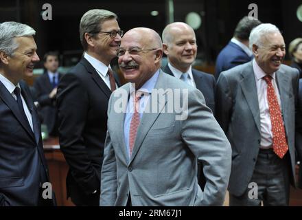 Bildnummer: 60834255  Datum: 16.12.2013  Copyright: imago/Xinhua     (131216) -- BRUSSELS, Dec 16, 2013 (xinhua) -- Hungarian Foreign minister Janos Martonyi (C) walks past Belgian Foreign Minister Didier Reynders, German Foreign minister Guido Westerwelle, British Foreign Secretary of State for Foreign and Commonwealth Affairs William Hague, and Spanish Foreign minister Jose Manuel Garcia Margallo (from L to R, back) before an Foreign Ministers meeting at the EU Headquarters in Brussels, capital of Belgium, Dec 16, 2013. (Xinhua/Ye Pingfan) BELGIUM-BRUSSELS-EU-FM-MEETING PUBLICATIONxNOTxINxCH Stock Photo