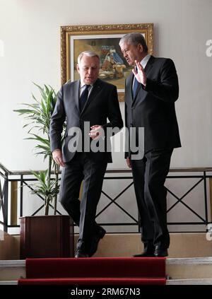 Bildnummer: 60835878  Datum: 16.12.2013  Copyright: imago/Xinhua     (131216) -- Algiers, Dec.16, 2013(Xinhua) -- Algeria s Prime Minister Abdelmalek Sellal (R) walks with French Prime Minister Jean-Marc Ayrault to attend the press conference in Algiers, Dec.16, 2013.(Xinhua/Mohamed Kadri)(hcl) ALGERIA-ALGIERS-SELLAL-AYRAULT PUBLICATIONxNOTxINxCHN People Politik xns x0x 2013 hoch premiumd Stock Photo