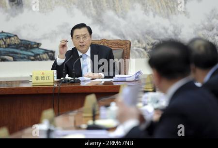 Bildnummer: 60834296  Datum: 16.12.2013  Copyright: imago/Xinhua     (131216) -- BEIJING, Dec. 16, 2013 (Xinhua) -- Zhang Dejiang, chairman of the Standing Committee of the National People s Congress (NPC), presides over the 14th meeting of the Chairmen s Council of the 12th NPC Standing Committee at the Great Hall of the in Beijing, capital of China, Dec. 16, 2013. (Xinhua/Zhang Duo) (mp) CHINA-ZHANG DEJIANG-NPC-CHAIRMEN S COUNCIL-MEETING (CN) PUBLICATIONxNOTxINxCHN xcb x0x 2013 quer Stock Photo