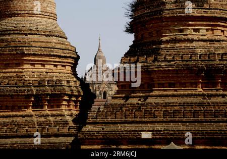 (140116) -- BAGAN, (Xinhua) -- Tempel werden in der antiken Stadt Bagan in der Region Mandalay, Myanmar, 15. Januar 2014 gesehen. Bagan, das vom 11. Bis 13. Jahrhundert als antike Hauptstadt und buddhistisches Zentrum mit etwa 10.000 Pagoden und religiösen Strukturen über 80 Quadratkilometer lang stand, ist heute mit über 2.000 Ruinen erhalten. (Xinhua/U Aung)(ctt) MYANMAR-BAGAN-LANDSCHAFT PUBLICATIONxNOTxINxCHN Bagan XINHUA Tempel sind Seen in der antiken Stadt Bagan in Mandalay Region Myanmar 15. Januar 2014 Bagan, die vom 11. Bis 13. Jahrhundert als antike Hauptstadt stand, und buddhistisches Zentrum mit A Stockfoto