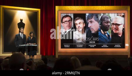 (140116) -- LOS ANGELES, Jan. 16, 2014 (Xinhua) -- Actor Chris Hemsworth (L) and Academy of Motion Picture Arts and Sciences President Cheryl Boone Isaacs announce the nominees for Best Director at the 86th Academy Awards nominations announcement, at the Academy of Motion Picture Arts and Sciences, in Beverly Hills, California, the United States, Jan. 16, 2014. The Oscars will take place March 2, 2014 at the Dolby Theatre in Hollywood, California.(Xinhua/Yang Lei) US-LOS ANGELES-ACADEMY AWARDS-NOMINATION PUBLICATIONxNOTxINxCHN   Los Angeles Jan 16 2014 XINHUA Actor Chris  l and Academy of Moti Stock Photo