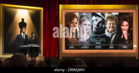 (140116) -- LOS ANGELES, 16. Januar 2014 (Xinhua) -- Schauspieler Chris Hemsworth (L) und der Präsident der Academy of Motion Picture Arts and Sciences, Cheryl Boone Isaacs, kündigen die Nominierungen für die beste Schauspielerin bei der 86th Academy Awards Nominierungen an der Academy of Motion Picture Arts and Sciences in Beverly Hills, Kalifornien, USA, am 16. Januar an. 2014. die Oscars finden am 2. März 2014 im Dolby Theatre in Hollywood, Kalifornien, statt. (Xinhua/Yang Lei) US-LOS ANGELES-ACADEMY AWARDS-NOMINIERUNG PUBLICATIONxNOTxINxCHN Los Angeles 16. Januar 2014 XINHUA-Schauspieler Chris l und Academy of Motio Stockfoto