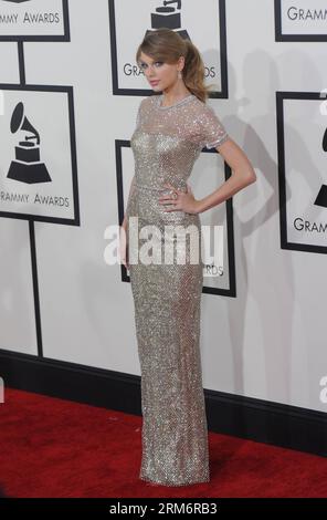 Taylor Swift trifft am 26. Januar 2014 auf dem roten Teppich für die 56. Grammy Awards im Staples Center in Los Angeles ein. (Xinhua/Yang Lei) (zjl) US-LOS ANGELES-GRAMMY AWARDS-ARRIVALS PUBLICATIONxNOTxINxCHN Taylor Swift trifft AM 26 2014. Januar AUF dem roten Teppich für die 56. Grammy Awards IM Staples Center in Los Angeles ein Stockfoto