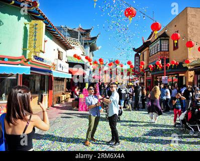 LOS ANGELES, (Xinhua) -- Tourist celebrate in the Golden Dragon Parade in Los Angeles, the United States, Feb. 1, 2014. The 115th Golden Dragon Parade was held here on Saturday to celebrate Chinese Lunar New Year. (Xinhua/Zhang Chaoqun) (lyx) U.S.-LOS ANGELES-CHINESE LUNAR NEW YEAR-GOLDEN DRAGON PARADE PUBLICATIONxNOTxINxCHN   Los Angeles XINHUA Tourist Celebrate in The Golden Dragon Parade in Los Angeles The United States Feb 1 2014 The 115th Golden Dragon Parade what Hero Here ON Saturday to Celebrate Chinese Lunar New Year XINHUA Zhang Chaoqun lyx U S Los Angeles Chinese Lunar New Year Gold Stock Photo