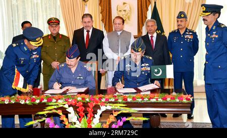 (140210) -- ISLAMABAD, Feb. 10, 2014 (Xinhua) -- Photo released by Press Information Department (PID) on Feb. 10, 2014 shows, Pakistani Prime Minister Muhammad Nawaz Sharif (3rd L rear) witnessing an agreement signing ceremony between Pakistan Air Force and Iraq Air Force in Islamabad, capital of Pakistan. Pakistani Prime Minister Nawaz Sharif Monday said that Pakistan will provide assistance to Iraq in fields of training and development. (Xinhua/PID) PAKISTAN-ISLAMABAD-IRAQ-TRAINING PUBLICATIONxNOTxINxCHN   140210 Islamabad Feb 10 2014 XINHUA Photo released by Press Information Department PID Stock Photo