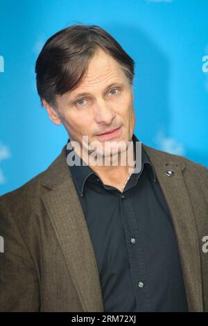 (140211) -- BERLIN, Feb. 11, 2014 (Xinhua) -- Danish American actor Viggo Mortensen poses for photos during a photocall to promote the movie The Two Faces of January at the 64th Berlinale International Film Festival in Berlin, Germany, on Feb. 11, 2013. (Xinhua/Zhang Fan) GERMANY-BERLIN-FILM FESTIVAL-VIGGO MORTENSEN PUBLICATIONxNOTxINxCHN   Berlin Feb 11 2014 XINHUA Danish American Actor Viggo Mortensen Poses for Photos during a photo call to promote The Movie The Two Faces of January AT The 64th Berlinale International Film Festival in Berlin Germany ON Feb 11 2013 XINHUA Zhang supporter Germ Stock Photo