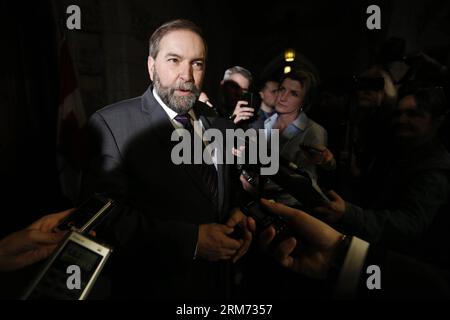 (140212) -- OTTAWA, (Xinhua) -- Thomas Mulcair, leader of the opposition New Democratic Party, speaks to reporters about the new federal budget, unveiled by Finance Minister Jim Flaherty at Parliament Hill in Ottawa, Canada, Feb. 11, 2014. Jim Flaherty on Tuesday unveiled a federal budget projecting a surplus in 2015. (Xinhua/David Kawai) CANADA-OTTAWA-BUDGET PUBLICATIONxNOTxINxCHN   Ottawa XINHUA Thomas  Leader of The Opposition New Democratic Party Speaks to Reporters About The New Federal Budget unveiled by Finance Ministers Jim Flaherty AT Parliament Hill in Ottawa Canada Feb 11 2014 Jim F Stockfoto