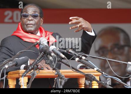 (140224) -- MARONDERA, Feb. 23 (Xinhua) -- Zimbabwe s President Robert Mugabe addresses the crowd during celebrations to mark his 90th birthday at Marondera, 75 km from Harare, Zimbabwe, February 23, 2014. Mugabe, who turned 90 on Friday, is the oldest leader in Africa. (Xinhua/Stringer) ZIMBABWE-MARONDERA-ROBERT MUGABE-90TH BIRTHDAY PUBLICATIONxNOTxINxCHN   Marondera Feb 23 XINHUA Zimbabwe S President Robert Mugabe addresses The Crowd during celebrations to Mark His 90th Birthday AT Marondera 75 km from Harare Zimbabwe February 23 2014 Mugabe Who turned 90 ON Friday IS The Oldest Leader in Af Stock Photo