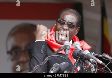 (140224) -- MARONDERA, Feb. 23 (Xinhua) -- Zimbabwe s President Robert Mugabe addresses the crowd during celebrations to mark his 90th birthday at Marondera, 75 km from Harare, Zimbabwe, February 23, 2014. Mugabe, who turned 90 on Friday, reinforcing his record as Africa s oldest president and one of the longest reigning on the continent. (Xinhua/Stringer) ZIMBABWE-MARONDERA-ROBERT MUGABE-90TH BIRTHDAY PUBLICATIONxNOTxINxCHN   Marondera Feb 23 XINHUA Zimbabwe S President Robert Mugabe addresses The Crowd during celebrations to Mark His 90th Birthday AT Marondera 75 km from Harare Zimbabwe Febr Stock Photo