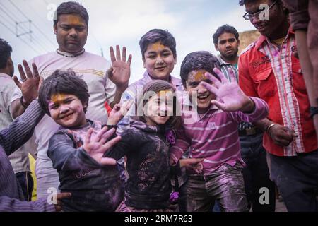 MATHURA, March 12, 2014 (Xinhua) -- People enjoy themselves at the Lathmar Holi in Mathura, Uttar Pradesh in India, March 12, 2014. Lathmar Holi is a local celebration in Mathura, and it takes place well before the national Holi day on March 17 this year. (Xinhua/Zheng Huansong)(lmz) INDIA-MATHURA-LATHMAR HOLI PUBLICATIONxNOTxINxCHN   Mathura March 12 2014 XINHUA Celebrities Enjoy themselves AT The  Holi in Mathura Uttar Pradesh in India March 12 2014  Holi IS a Local Celebration in Mathura and IT Takes Place Well Before The National Holi Day ON March 17 This Year XINHUA Zheng Huansong  India Stock Photo