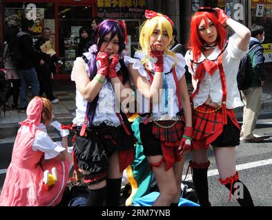 OSAKA,  Cosplayers pose during the Nippombashi Street Festa in Osaka, Japan, March 21, 2014. The tenth Nippombashi Street Festa held here on Friday attracted thousands of cosplayers throughout Japan. (Xinhua/Ma Xinghua) JAPAN-OSAKA-NIPPOMBASHI STREET FESTA-COSPLAY PUBLICATIONxNOTxINxCHN   Osaka Cosplayers Pose during The  Street FESTA in Osaka Japan March 21 2014 The Tenth  Street FESTA Hero Here ON Friday attracted thousands of Cosplayers throughout Japan XINHUA MA Xinghua Japan Osaka  Street FESTA Cosplay PUBLICATIONxNOTxINxCHN Stock Photo