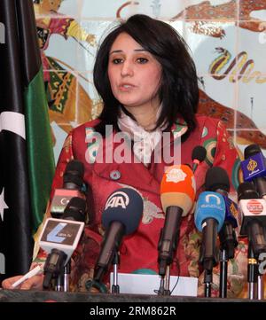 (140329) -- TRIPOLI, 29. März 2014 (Xinhua) -- Lamia Abu Sidra, Unterstaatssekretärin des libyschen Informationsministeriums, spricht am 29. März 2014 in Tripolis, Libyen, an der Eröffnungszeremonie des libyschen Medienreform- und -Entwicklungsprojekts. Das Projekt wurde von der Europäischen Union finanziert und von der Deutschen Welle Akademie und dem Institut für Krieg und Frieden durchgeführt. (Xinhua/Hamza Turkia) ERÖFFNUNGSZEREMONIE des PROJEKTS LIBYEN-TRIPOLI-MEDIA PUBLICATIONxNOTxINxCHN TRIPOLI März 29 2014 XINHUA Lamia Abu Sidra, Unterstaatssekretär des libyschen Informationsministeriums, spricht zur Eröffnungszeremonie des libyschen Medienreformers Stockfoto