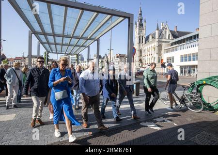 Sint Niklaas, Belgium. 27th Aug, 2023. Tom Lanoye (C) arrives for the celebrations for the 65th birthday of writer Lanoye, Sunday 27 August 2023 in Sint-Niklaas. BELGA PHOTO NICOLAS MAETERLINCK Credit: Belga News Agency/Alamy Live News Stock Photo