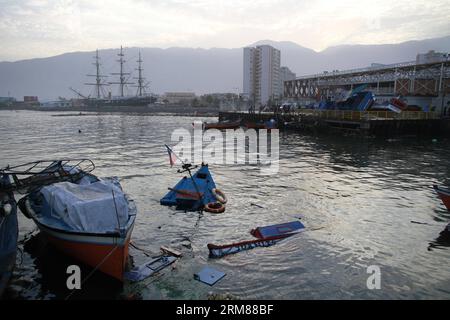 (140402) -- IQUIQUE, 2. April 2014 (Xinhua) -- Boote bleiben nach einem Erdbeben in der Dienstagnacht in Caleta Guardia Marina Riquelme, in Iquique, Nord-Chile, am 2. April 2014 beschädigt. Ein Erdbeben der Stärke 8,2 traf am Dienstag vor der Nordküste Chiles und hinterließ fünf Tote und drei Schwerverletzte, während Tausende von Menschen aufgrund eines Tsunamialarms evakuiert wurden. (Xinhua/Str) (jg) (sp) CHILE-IQUIQUE-UMWELT-ERDBEBEN PUBLICATIONxNOTxINxCHN Iquique 2. April 2014 XINHUA-Boote bleiben nach dem Erdbeben AM Dienstagabend in Caleta Guardia Marina Riquelme in Iquique beschädigt Stockfoto
