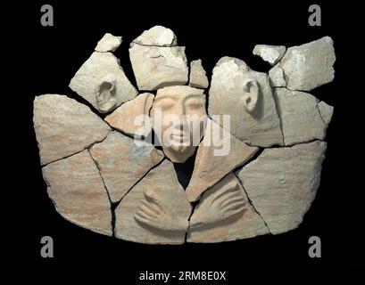 (140410) -- JERUSALEM, April 7, 2014 (Xinhua) -- Photo taken on April 7, 2014, and released by Israel s Antiquities Authority shows a sarcophagus at Tel Shadud, an archaeological mound in the Jezreel Valley, northern Israel. A 3,200-year-old coffin containing Egyptian valuables that archaeologists believe belonged to a high-ranking Canaanite official has been discovered in northern Israel, Israel s Antiquities Authority announced on April 9, 2014. The clay sarcophagus was found last December in the Jezreel Valley near Tel Shadud in northern Israel during the digging of a natural gas pipeline. Stock Photo