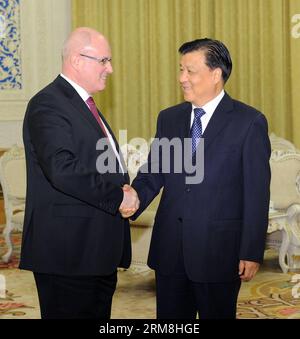 (140415) -- BEIJING, April 15, 2014 (Xinhua) -- Liu Yunshan (R), a member of the Standing Committee of the Political Bureau of the Central Committee of the Communist Party of China (CPC), meets with Volker Kauder, leader of the Christian Democratic Union (CDU) of Germany, in Beijing, capital of China, April 15, 2014. (Xinhua/Rao Aimin) (zc) CHINA-BEIJING-LIU YUNSHAN-GERMAN GUEST-MEETING (CN) PUBLICATIONxNOTxINxCHN   Beijing April 15 2014 XINHUA Liu Yunshan r a member of The thing Committee of The Political Bureau of The Central Committee of The Communist Party of China CPC Meets With Volker Ka Stock Photo