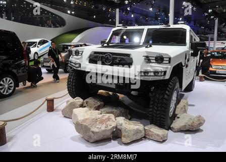 (140420) -- BEIJING, April 20, 2014 (Xinhua) -- A Dongfeng Mengshi (Warrior) off-road sport utility vehicle is displayed during the media preview of the 2014 Beijing International Automotive Exhibition in Beijing, China, April 20, 2014. The auto show will be held on April 21-29, attracting over 2,000 exhibitors from 14 countries and regions. (Xinhua/Luo Xiaoguang) (hdt) CHINA-BEIJING-AUTO-EXHIBITION (CN) PUBLICATIONxNOTxINxCHN   Beijing April 20 2014 XINHUA a Dongfeng  Warrior off Road Sports Utility Vehicle IS displayed during The Media Preview of The 2014 Beijing International Automotive Exh Stock Photo