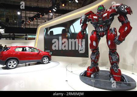 (140420) -- BEIJING, April 20, 2014 (Xinhua) -- A transformer model stands during the media preview of the 2014 Beijing International Automotive Exhibition in Beijing, China, April 20, 2014. The auto show will be held on April 21-29, attracting over 2,000 exhibitors from 14 countries and regions. (Xinhua/Li Mingfang) (hdt) CHINA-BEIJING-AUTO-EXHIBITION (CN) PUBLICATIONxNOTxINxCHN   Beijing April 20 2014 XINHUA a Transformer Model stands during The Media Preview of The 2014 Beijing International Automotive Exhibition in Beijing China April 20 2014 The Car Show will Be Hero ON April 21 29 Attrac Stock Photo