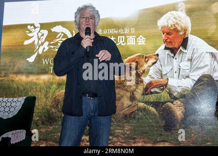 (140421) -- BEIJING, April 21, 2014 (Xinhua) -- Jean-Jacques Annaud, director of the movie of Wolf Totem, speaks during a press meeting in Beijing, capital of China, April 21, 2014. (Xinhua/Zhang Yu) (wyo) CHINA-BEIJING-MOVIE-WOLF TOTEM-PRESS MEETING (CN) PUBLICATIONxNOTxINxCHN   Beijing April 21 2014 XINHUA Jean Jacques Annaud Director of The Movie of Wolf Totem Speaks during a Press Meeting in Beijing Capital of China April 21 2014 XINHUA Zhang Yu  China Beijing Movie Wolf Totem Press Meeting CN PUBLICATIONxNOTxINxCHN Stock Photo