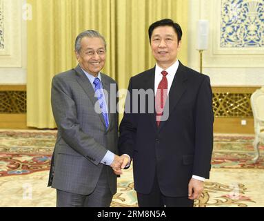 (140421) -- BEIJING, April 21, 2014 (Xinhua) -- Chinese Vice President Li Yuanchao (R) meets with former Malaysian prime minister Mahathir Mohamad in Beijing, capital of China, April 21, 2014. (Xinhua/Ma Zhancheng) (zkr) CHINA-BEIJING-LI YUANCHAO-MALAYSIA-MAHATHIR-MEETING(CN) PUBLICATIONxNOTxINxCHN   Beijing April 21 2014 XINHUA Chinese Vice President left Yuan Chao r Meets With Former Malaysian Prime Ministers Mahathir Mohamad in Beijing Capital of China April 21 2014 XINHUA MA Zhancheng CCR China Beijing left Yuan Chao Malaysia Mahathir Meeting CN PUBLICATIONxNOTxINxCHN Stock Photo