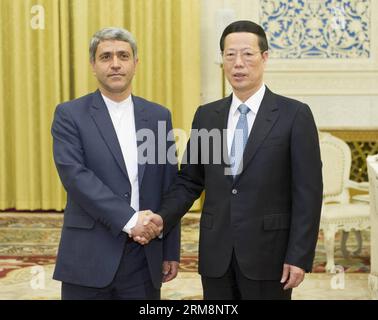 (140422) -- PEKING, 22. April 2014 (Xinhua) -- der chinesische Vize-Ministerpräsident Zhang Gaoli (R) trifft sich am 22. April 2014 in Peking, der Hauptstadt Chinas, mit dem iranischen Wirtschafts- und Finanzminister Ali Tayebnia. (Xinhua/Huang Jingwen) (zgp) CHINA-BEIJING-ZHANG GAOLI-ALI TAYEBNIA-MEETING (CN) PUBLICATIONxNOTxINxCHN Peking 22. April 2014 XINHUA chinesischer Vize-Ministerpräsident zhang Gaoli r trifft sich mit iranischen Wirtschafts- und Finanzministern Ali in Peking Hauptstadt Chinas 22. April 2014 XINHUA Huang jingzingzinchugp China-Treffen Peking Stockfoto