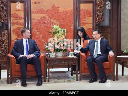 (140423) -- BEIJING, April 23, 2014 (Xinhua) -- Chinese Premier Li Keqiang (R) meets with British Health Secretary Jeremy Hunt in Beijing, capital of China, April 23, 2014. Jeremy is here to co-chair the second meeting of the China-Britain mechanism for high-level cultural exchanges with Chinese Vice Premier Liu Yandong. (Xinhua/Li Tao) (mp) CHINA-BEIJING-LI KEQIANG-BRITISH HEALTH SECRETARY-MEETING (CN) PUBLICATIONxNOTxINxCHN   Beijing April 23 2014 XINHUA Chinese Premier left Keqiang r Meets With British Health Secretary Jeremy Hunt in Beijing Capital of China April 23 2014 Jeremy IS Here to Stock Photo