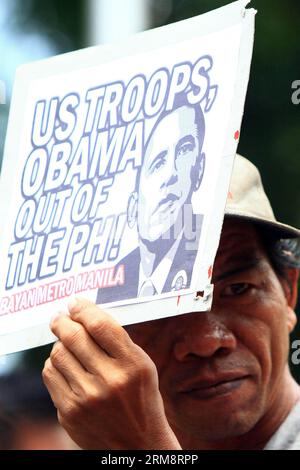 (140425) -- MANILA, 25. April 2014 (Xinhua) -- ein Aktivist hält ein Plakat gegen die USA während einer Protestkundgebung in Manila auf den Philippinen am 25. April 2014. Die Demonstranten verurteilen den bevorstehenden Staatsbesuch von US-Präsident Barack Obama, um Zeuge der Unterzeichnung des Abkommens über verstärkte Verteidigungszusammenarbeit zu werden, das US-Militärbasen in das Land zurückbringen würde. (Xinhua/Rouelle Umali) PHILIPPINEN-MANILA-OBAMA-RALLY PUBLICATIONxNOTxINxCHN Manila April 25 2014 XINHUA an Aktivist hält ein Plakat gegen die USA während einer Protestdemonstration in Manila auf den Philippinen AM 25 2014. April Stockfoto