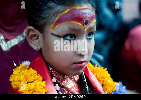 (140504) -- LALITPUR, May 4 , 2014 (Xinhua) -- Lalitpur living goddess watches the chariot procession of Rato Machhindranath in Lalitpur, Nepal, May 3, 2014. Rato Machhindranath Rath Jatra is one of the longest and most interesting festivals in Patan (Lalitpur), Nepal. The Rato Machhindranath Jatra festival is believed to have started in 11th century. (Xinhua/Patap Thapa) NEPAL-LALITPUR-FESTIVAL PUBLICATIONxNOTxINxCHN   Lalitpur May 4 2014 XINHUA Lalitpur Living Goddess Watches The Chariot Procession of Rato Machhindranath in Lalitpur Nepal May 3 2014 Rato Machhindranath Rath Jatra IS One of T Stock Photo