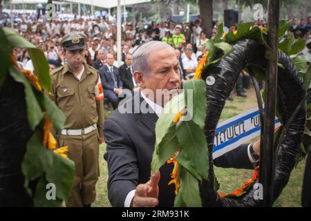 Israeli Prime Minister Benjamin Netanyahu lays a wreath during a ceremony marking the Memorial Day honoring fallen soldiers at the Mount Herzel military cemetery in Jerusalem, on May 5, 2014. Israel marked the Remembrance Day from sunset of May 4 to sunset of May 5 to commemorate its 23,169 fallen servicemen and women and victims of terrorism. (Xinhua/JINI/Emil Salman)(bxq) MIDEAST-JERUSALEM-ISRAEL-REMEMBRANCE DAY PUBLICATIONxNOTxINxCHN   Israeli Prime Ministers Benjamin Netanyahu Lays a  during a Ceremony marking The Memorial Day honoring Fall Soldiers AT The Mount Herzel Military Cemetery in Stock Photo