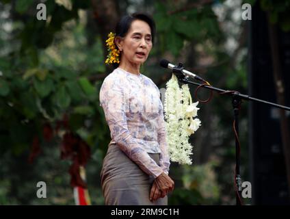 (140517) -- YANGON, May 17, 2014 (Xinhua) -- Leader of Myanmar s opposition National League for Democracy party Daw Aung San Suu Kyi speaks during a compaign in Yangon May 17, 2014. Daw Aung San Suu Kyi called Saturday on the public to back efforts to reform the Constitution. (Xinhua/U Aung) MYANMAR-YANGON-PUBLIC CAMPAIGN PUBLICATIONxNOTxINxCHN   Yangon May 17 2014 XINHUA Leader of Myanmar S Opposition National League for Democracy Party Daw Aung San Suu Kyi Speaks during a compaignin  in Yangon May 17 2014 Daw Aung San Suu Kyi called Saturday ON The Public to Back Efforts to Reform The Consti Stock Photo