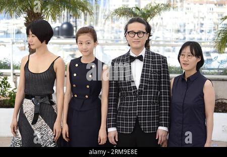 (140520) -- CANNES, May 20, 2014 (Xinhua) -- (From L to R) South Korean actress Doona Bae, actress Kim Sae Ron, actor Song Sae Byuk and director July Jung pose during the photocall of A girl at my door at the 67th Cannes Film Festival in Cannes, France, May 20, 2014. (Xinhua/Ye Pingfan) FRANCE-CANNES-FILM FESTIVAL-A GIRL AT MY DOOR-PHOTO CALL PUBLICATIONxNOTxINxCHN   Cannes May 20 2014 XINHUA from l to r South Korean actress doona BAe actress Kim Sae Ron Actor Song Sae  and Director July Young Pose during The photo call of a Girl AT My Door AT The 67th Cannes Film Festival in Cannes France May Stock Photo