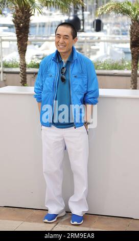 (140520) -- CANNES, May 20, 2014 (Xinhua) -- Chinese director Zhang Yimou poses during the photocall of Coming Home (Gui Lai) at the 67th Cannes Film Festival in Cannes, France, May 20, 2014. (Xinhua/Ye Pingfan) FRANCE-CANNES-FILM FESTIVAL-GUI LAI-PHOTO CALL PUBLICATIONxNOTxINxCHN   Cannes May 20 2014 XINHUA Chinese Director Zhang Yimou Poses during The photo call of Coming Home Gui Lai AT The 67th Cannes Film Festival in Cannes France May 20 2014 XINHUA Ye Pingfan France Cannes Film Festival Gui Lai Photo Call PUBLICATIONxNOTxINxCHN Stock Photo