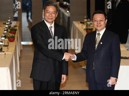 (140625) -- TAIPEI, June 25, 2014 (Xinhua) -- Zhang Zhijun (L), director of the Taiwan Affairs Office of China s State Council, meets with Taiwan s mainland affairs chief Wang Yu-chi in Taipei, southeast China s Taiwan, June 25, 2014. It was their second meeting this year. Wang visited the mainland in February. (Xinhua/Wang Shen) (ry) CHINA-TAIPEI-ZHANG ZHIJUN-MEETING (CN) PUBLICATIONxNOTxINxCHN   Taipei June 25 2014 XINHUA Zhang Zhijun l Director of The TAIWAN Affairs Office of China S State Council Meets With TAIWAN S Mainland Affairs Chief Wang Yu Chi in Taipei South East China S TAIWAN Jun Stock Photo