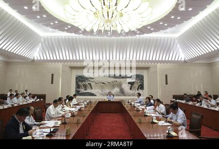 (140625) -- BEIJING, June 25, 2014 (Xinhua) -- Zhang Dejiang, chairman of China s 12th National People s Congress (NPC) Standing Committee, presides over the 25th meeting of the chairman and vice chairpersons of the 12th NPC Standing Committee at the Great Hall of the People in Beijing, capital of China, April 25, 2014. (Xinhua/Ding Lin) (hdt) CHINA-BEIJING-NPC-CHAIRPERSON-MEETING (CN) PUBLICATIONxNOTxINxCHN   Beijing June 25 2014 XINHUA Zhang Dejiang Chairman of China S 12th National Celebrities S Congress NPC thing Committee Presid Over The 25th Meeting of The Chairman and Vice chair persons Stock Photo